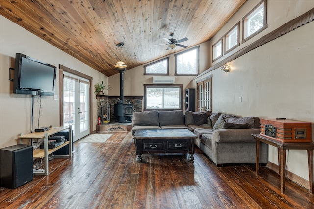 living room with ceiling fan, dark hardwood / wood-style flooring, a wall mounted AC, and french doors