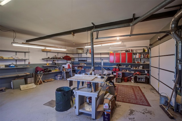 garage with a workshop area