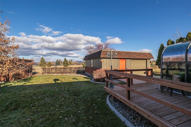 view of yard featuring a deck and a shed