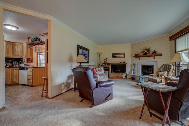 carpeted living room featuring a brick fireplace and crown molding