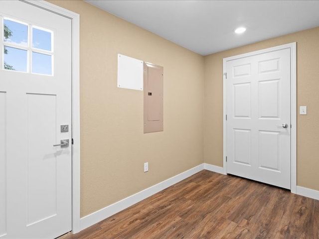 entryway with electric panel and dark hardwood / wood-style floors