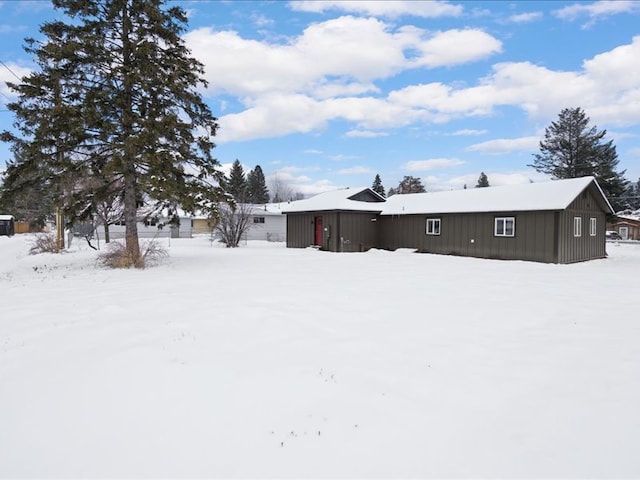 view of snow covered property