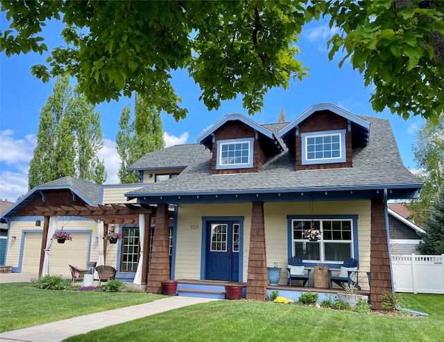 659 Copperwood Ct, Whitefish, MT 59937 - view of front of home featuring a pergola, a porch, roof with shingles, and a garage