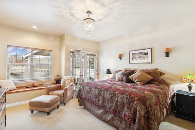 659 Copperwood Ct, Whitefish, MT 59937 - bedroom with light carpet, access to exterior, a chandelier, baseboards, and recessed lighting