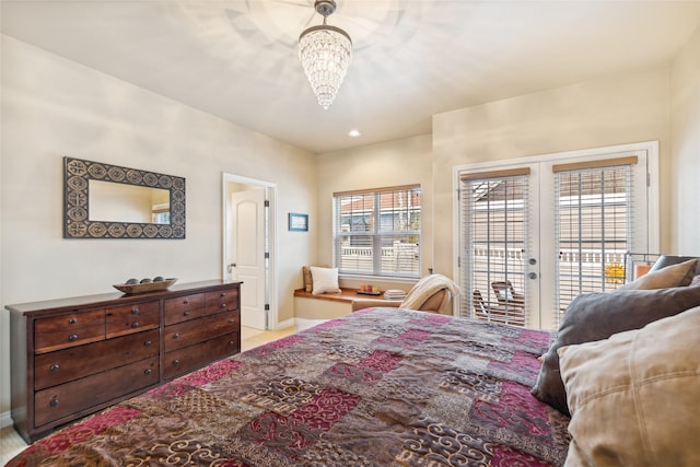 659 Copperwood Ct, Whitefish, MT 59937 - bedroom featuring access to outside, a chandelier, and baseboards
