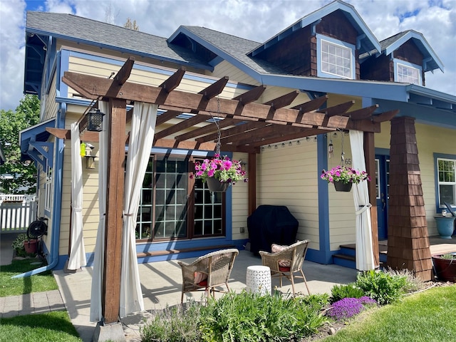 659 Copperwood Ct, Whitefish, MT 59937 - property entrance featuring a pergola, a patio area, and roof with shingles