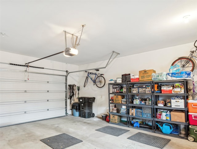 garage featuring a garage door opener