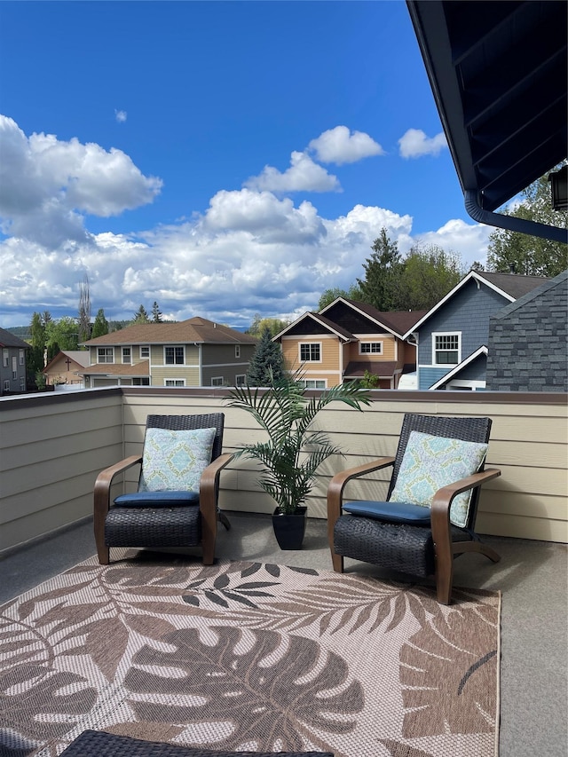 659 Copperwood Ct, Whitefish, MT 59937 - view of patio with a balcony and a residential view