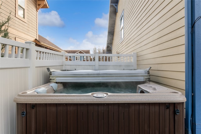 view of patio / terrace featuring a hot tub