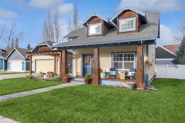 view of front of house with covered porch and a front yard