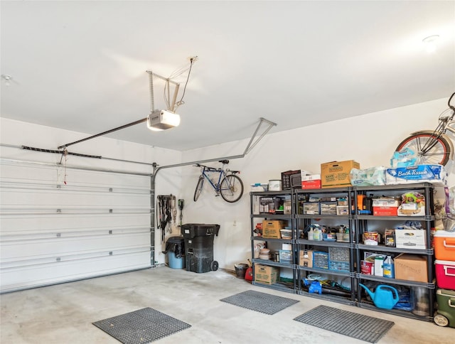659 Copperwood Ct, Whitefish, MT 59937 - garage featuring a garage door opener