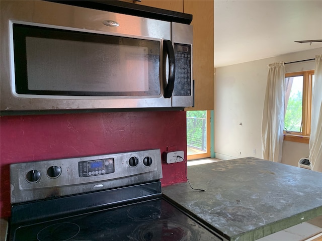 kitchen with black / electric stove