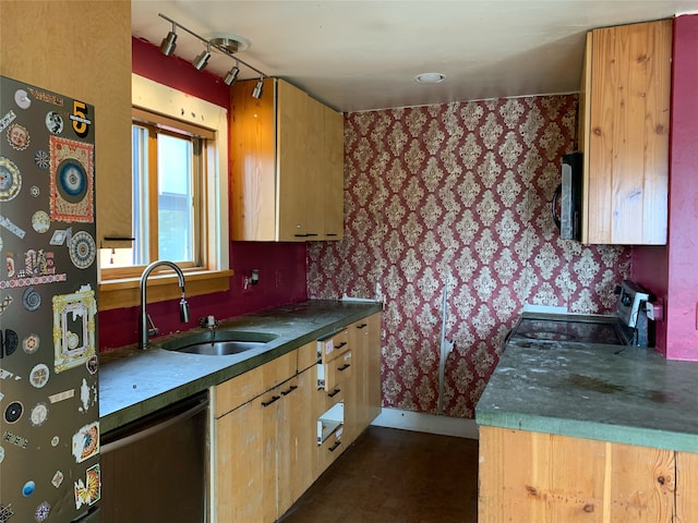 kitchen with sink and stainless steel appliances