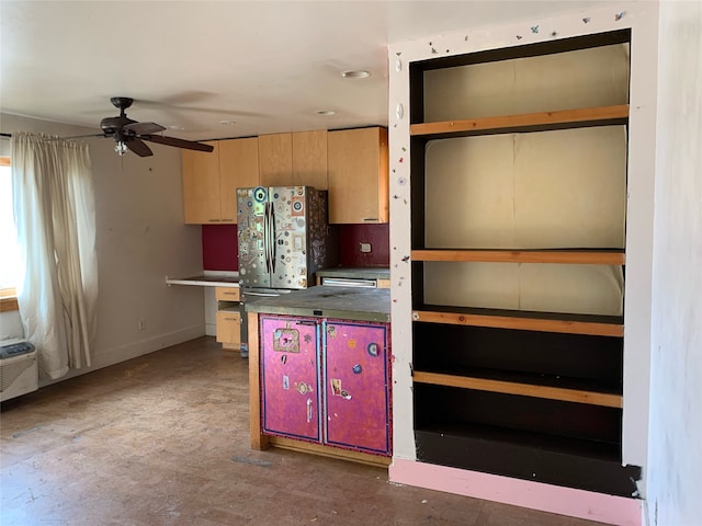 kitchen featuring fridge, a wall unit AC, and ceiling fan