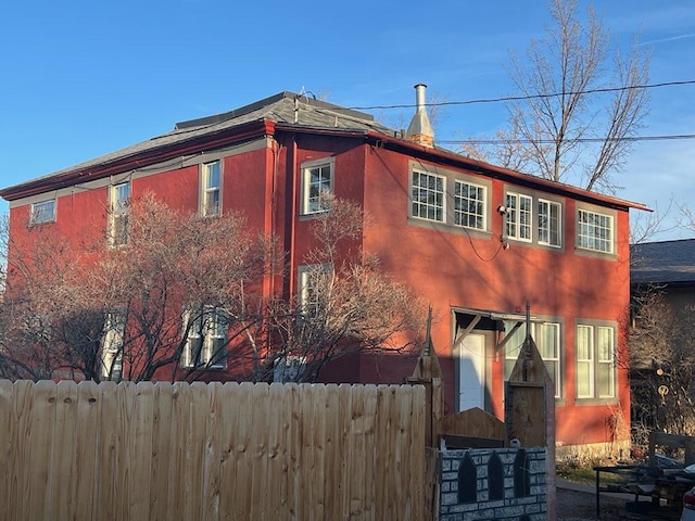 811 N Rodney St, Helena, MT 59601 - view of home's exterior featuring stucco siding