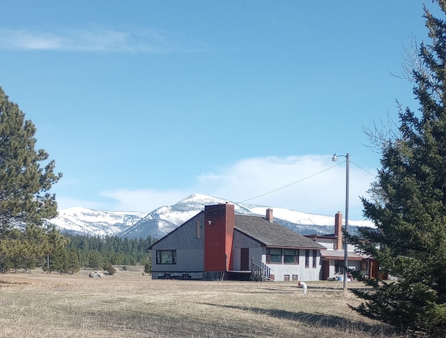 view of home's exterior featuring a mountain view