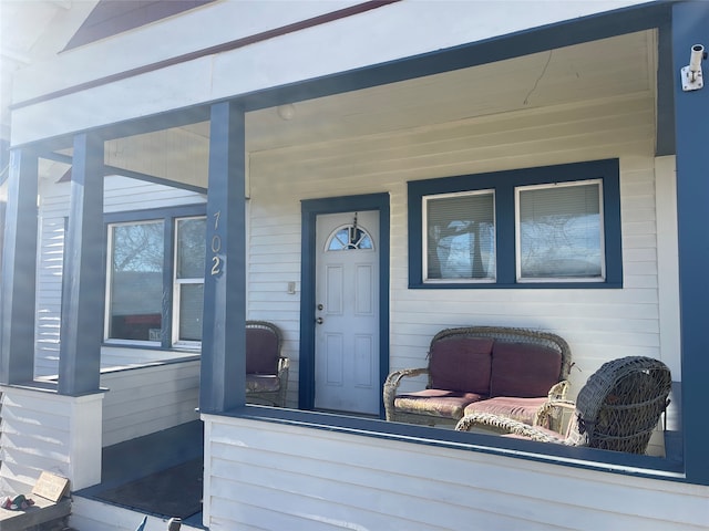 doorway to property with covered porch