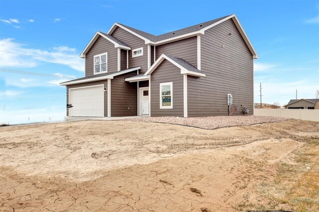 view of front of house with a garage