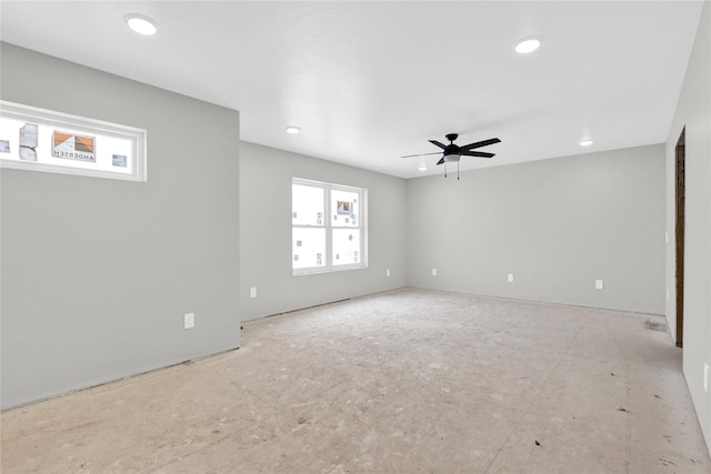 empty room with recessed lighting and ceiling fan