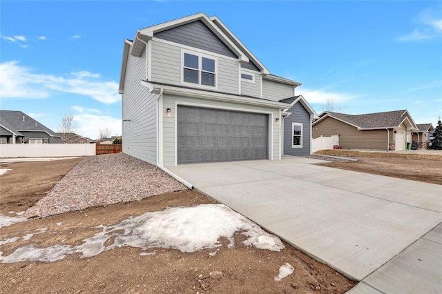 view of front of property with a garage