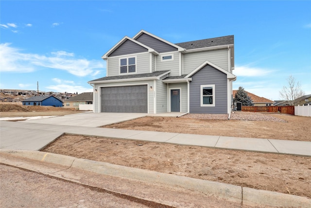 view of front of property with a garage