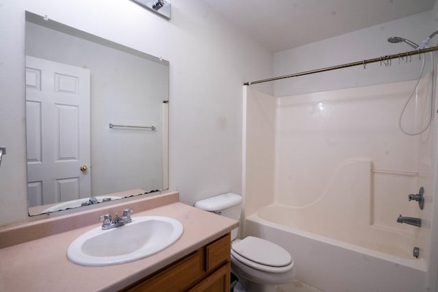 full bathroom featuring vanity,  shower combination, and toilet