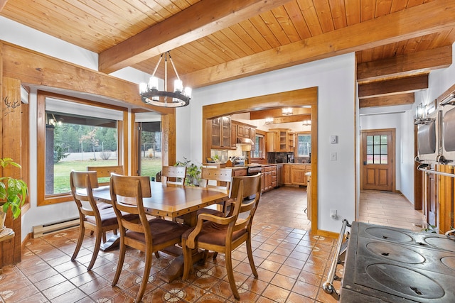 dining space featuring wooden ceiling, an inviting chandelier, baseboard heating, beamed ceiling, and light tile patterned flooring