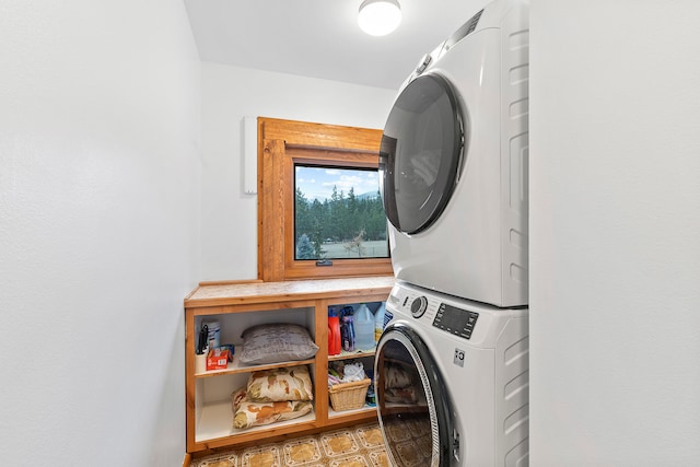 laundry room with stacked washer and clothes dryer