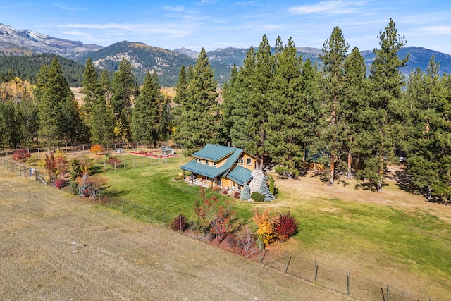 drone / aerial view with a mountain view and a rural view