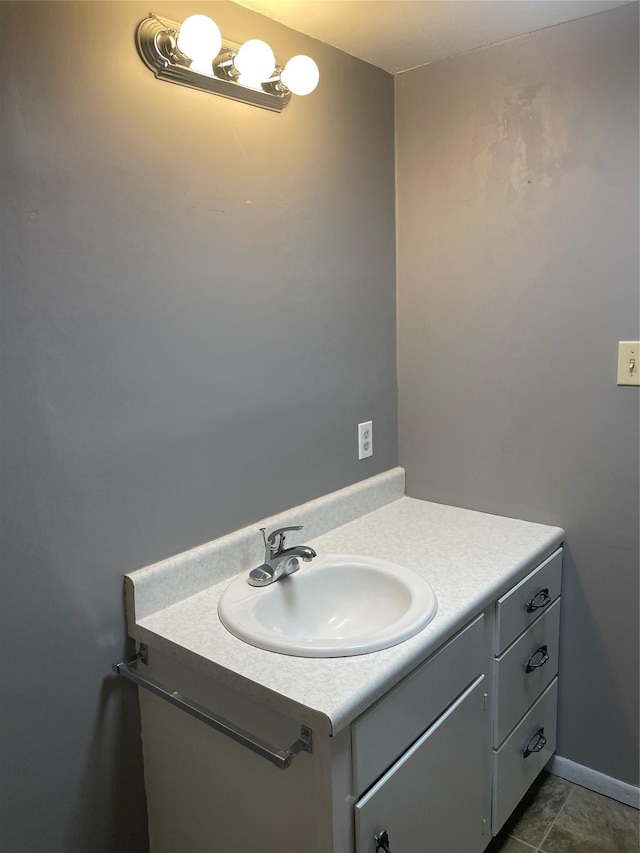 bathroom with vanity and tile patterned floors