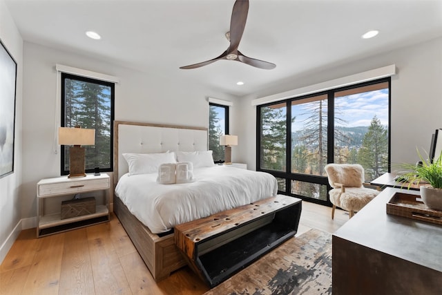 1148 Glades Dr, Whitefish, MT 59937 - bedroom with ceiling fan and light hardwood / wood-style floors
