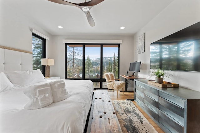 1148 Glades Dr, Whitefish, MT 59937 - bedroom with light wood-type flooring and ceiling fan