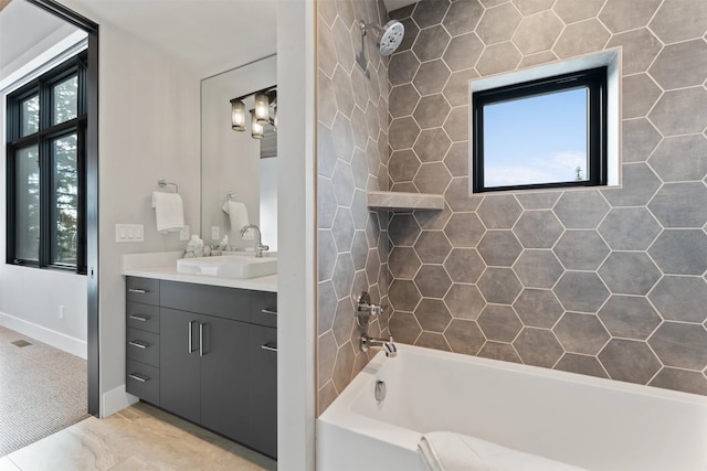 1148 Glades Dr, Whitefish, MT 59937 - bathroom with plenty of natural light, vanity, and tiled shower / bath combo