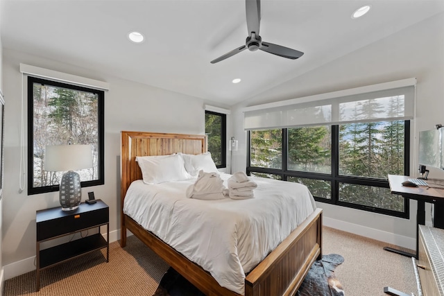 1148 Glades Dr, Whitefish, MT 59937 - bedroom featuring carpet, vaulted ceiling, multiple windows, and ceiling fan