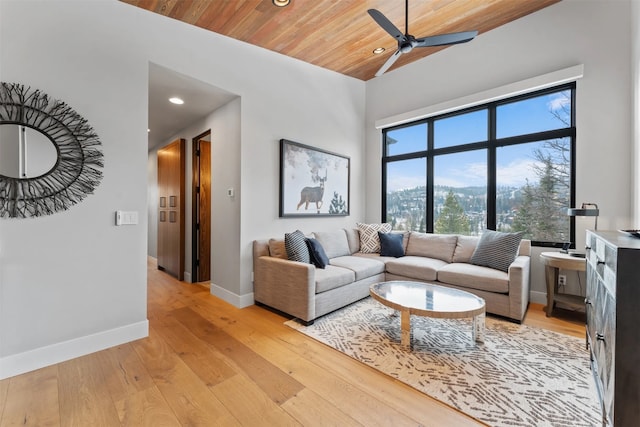 1148 Glades Dr, Whitefish, MT 59937 - living room featuring light hardwood / wood-style floors, ceiling fan, and wood ceiling