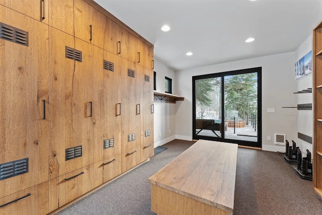 1148 Glades Dr, Whitefish, MT 59937 - doorway to outside featuring dark carpet