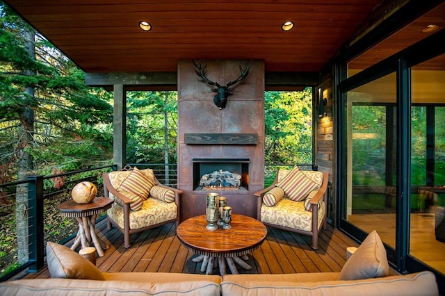 1148 Glades Dr, Whitefish, MT 59937 - sunroom with an outdoor living space with a fireplace