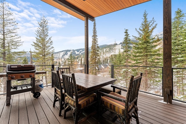 1148 Glades Dr, Whitefish, MT 59937 - wooden terrace with a mountain view and a grill
