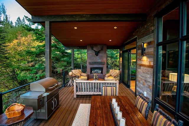 1148 Glades Dr, Whitefish, MT 59937 - deck with a large fireplace and area for grilling