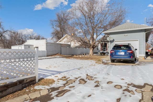 exterior space with a garage