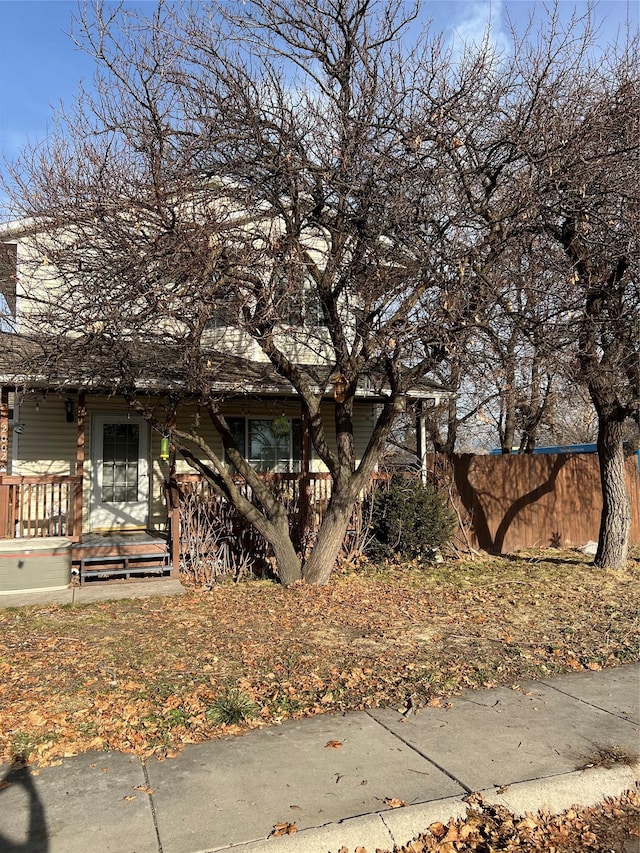 view of front of property with a wooden deck