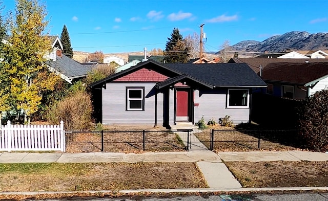 view of front of home featuring a mountain view