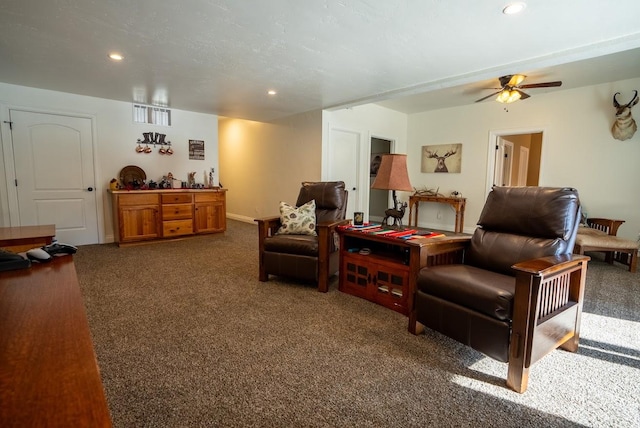 living room with dark colored carpet and ceiling fan