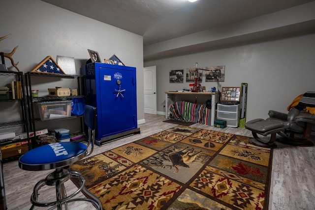 home office with hardwood / wood-style flooring