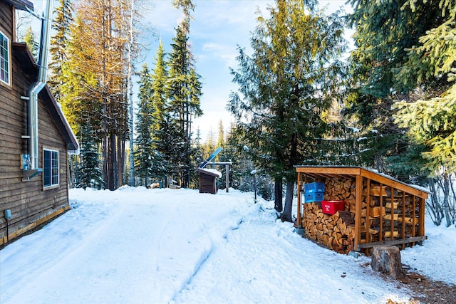 view of yard covered in snow