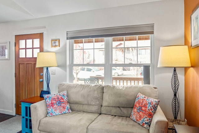 living room with lofted ceiling