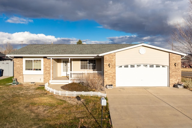 ranch-style home with a front yard, a porch, and a garage