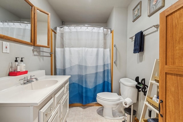 bathroom featuring tile patterned flooring, vanity, toilet, and a shower with shower curtain