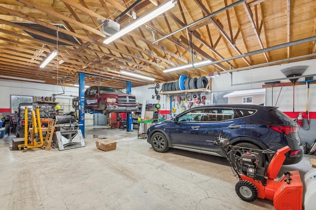 garage featuring a garage door opener