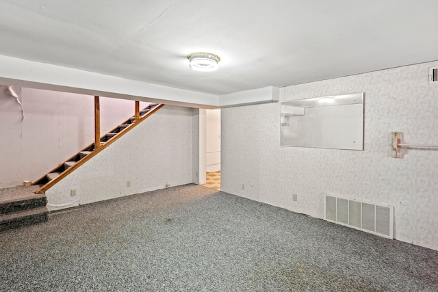 basement with carpet flooring